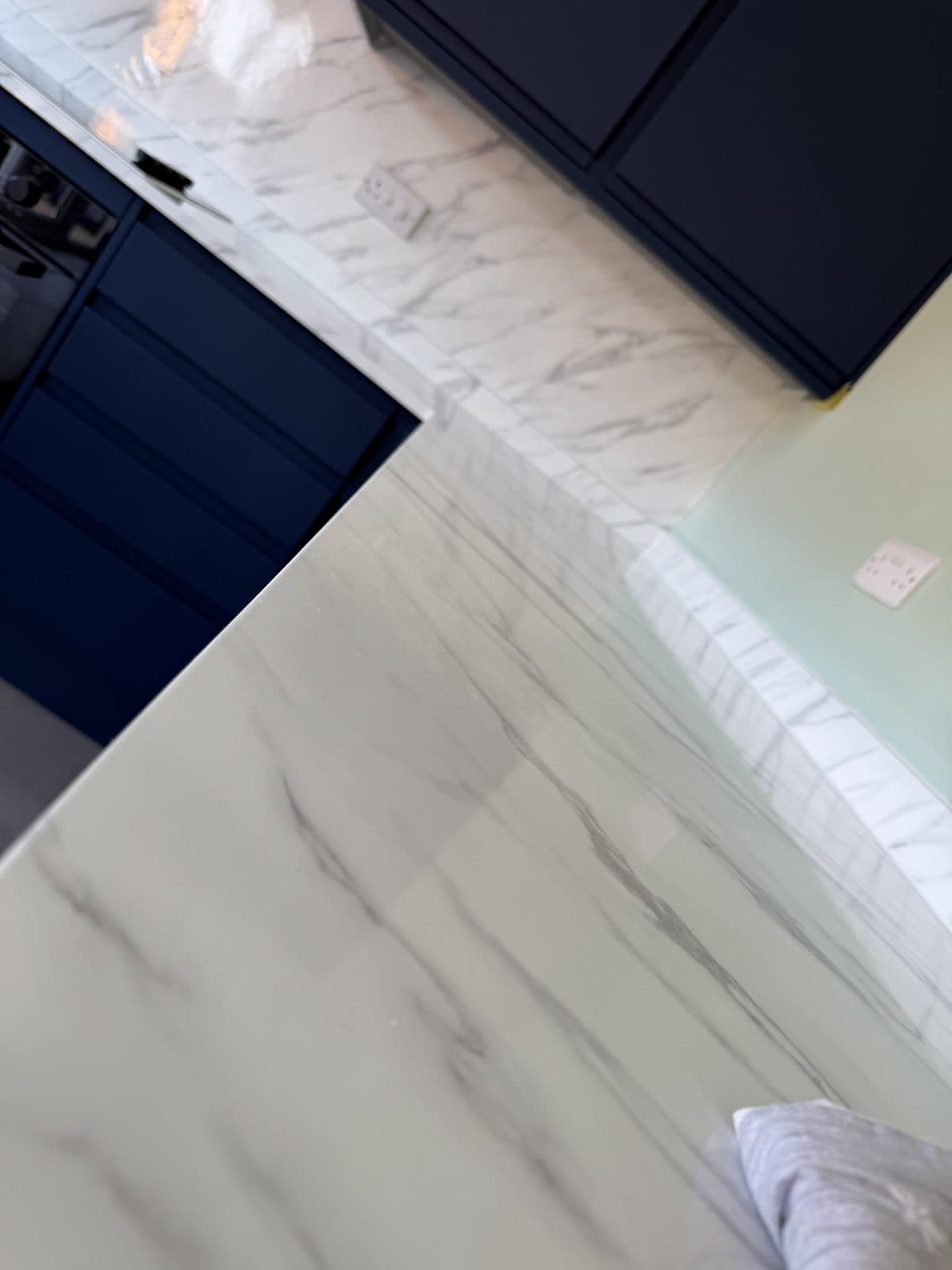 White marble high-gloss worktop wrap close-up — Doncaster kitchen