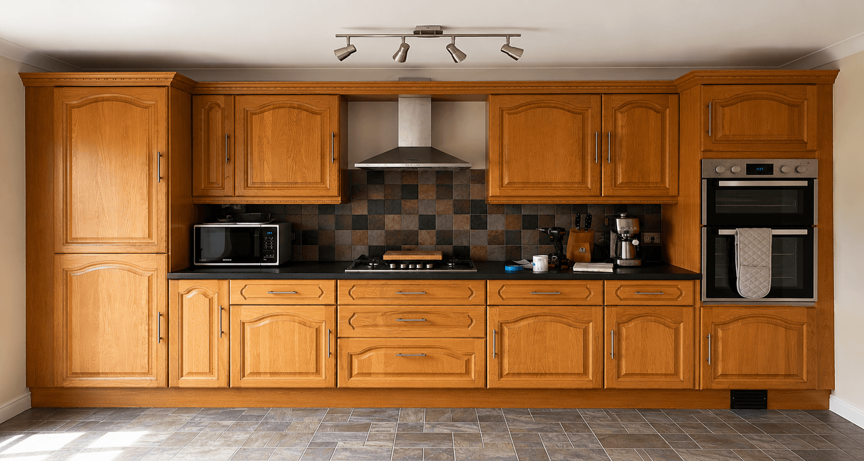 Kitchen before vinyl wrapping — oak cabinets, South Yorkshire