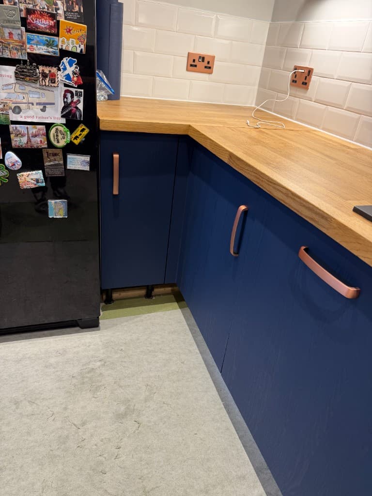 Full kitchen wrap result with updated cabinet surfaces